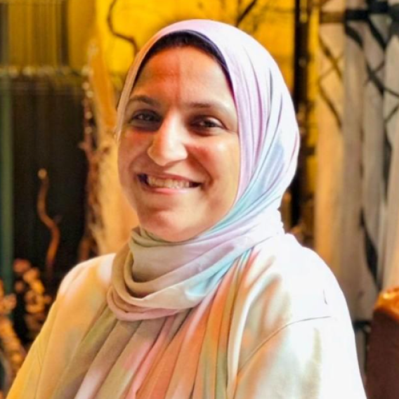 Neama Elsayed smiling at the camera 